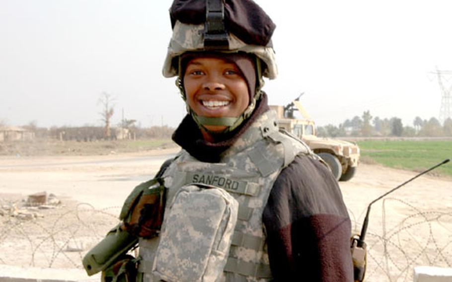 Pfc. De'Cassalyn Sanford, after two days manning a checkpoint south of Baghdad during the national elections.