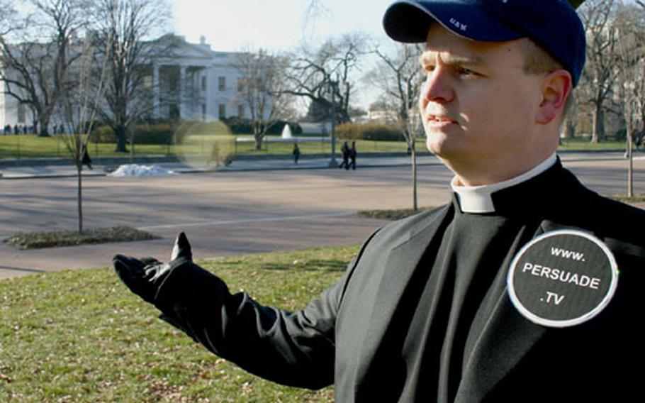 Navy Chaplain (Lt.) Gordon Klingenschmitt talks about his hunger strike on Thursday outside the White House. Klingenschmitt said he won't eat again until President Bush issues an order to "let me pray in Jesus's name."