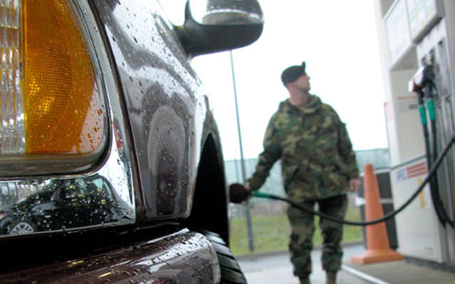 Staff Sgt. Allan David will spend a little less next month to gas up his SUV at Leighton Barracks. The Army and Air Force Exchange Service announced Wednesday that prices will fall between 16 and 22 cents in January.