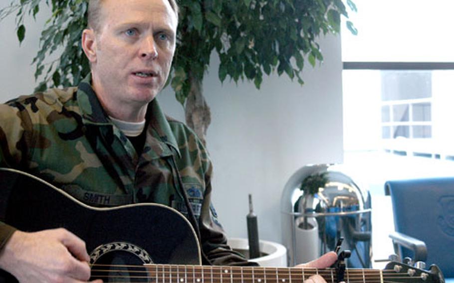 Tech. Sgt. Clay Smith sings a song from his upcoming album, due out in January.
