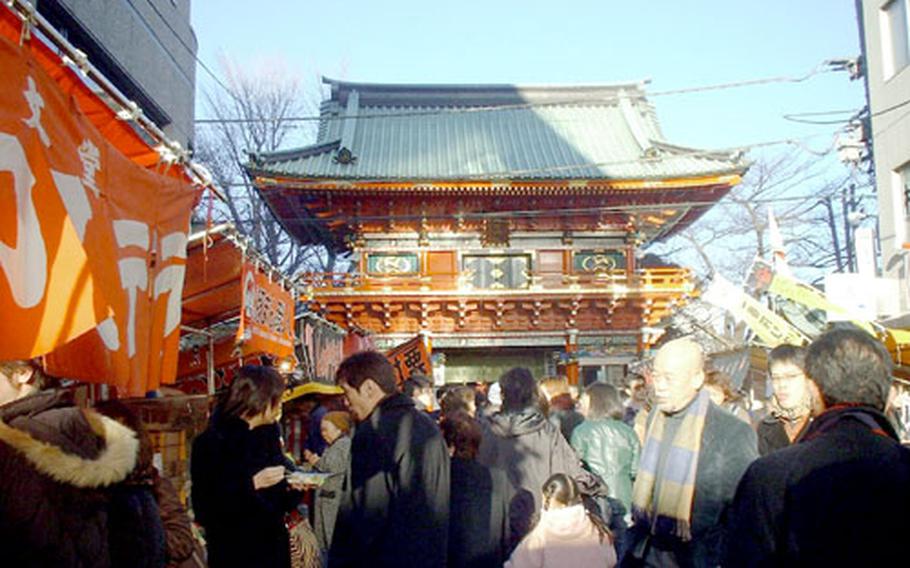 This file photo shows Shinagawa Shrine in Shinagawa, Tokyo, built in 1637, on the hill near JR Shinagawa Station. People come to celebrate the New Year at the shrine.