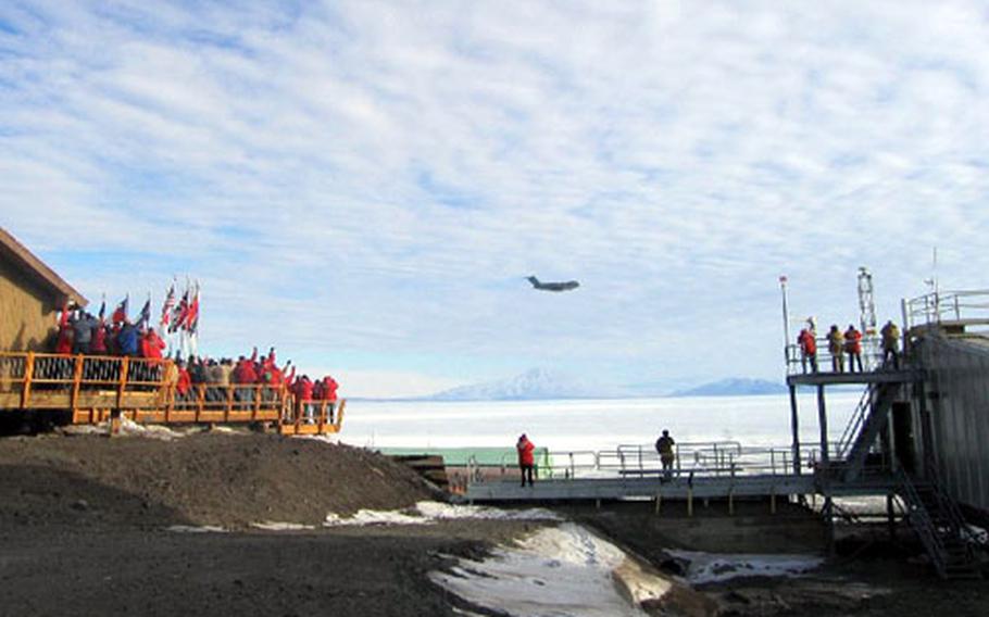 A McChord C-17 makes its final pass by McMurdo Station, Antarctica. This was the final flight of the 2004-2005 Deep Freeze season; the personnel at McMurdo did not see another aircraft until August.