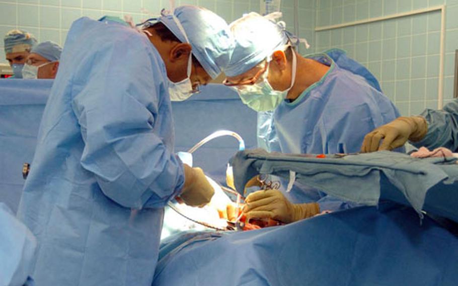 Landstuhl Regional Medical Center doctors perform surgery on a wounded servicemember. Today, the mortality rate among wounded troops is half of what it was during the Vietnam War.