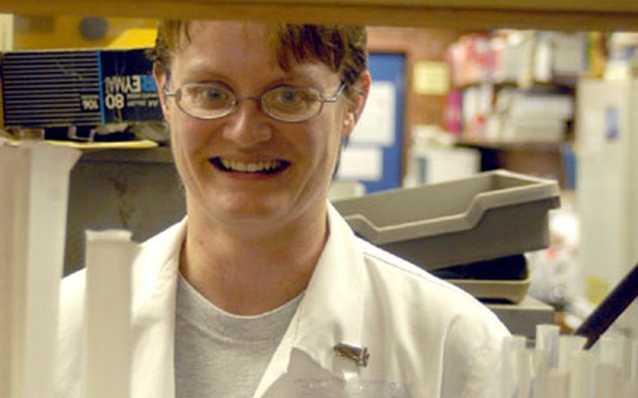 Cindee Parker, whose husband, Tech. Sgt. Thomas Parker, is stationed at RAF Alconbury, is a science technician at a British public school in Raunds. Working off base can be a great opportunity for some military spouses in the United Kingdom.