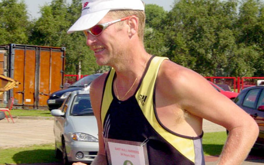 Senior Master Sgt. Garth Peterson pushes through the Hull 24-Hour race in 2003. “The goal, a lot of the time, is just to keep plodding along,” Peterson said.