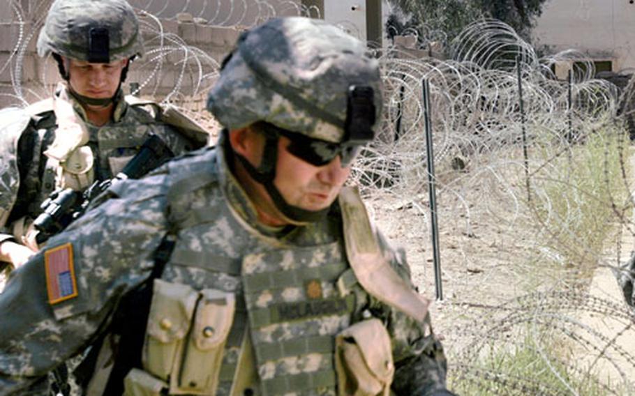 Lt. Col. Michael E. McLaughlin enters the Ramadi Government Center in September. McLaughlin was killed Thursday.