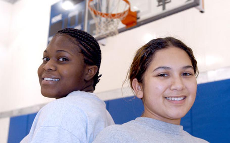 Vikki Sixtos, right, and Essie Belton are the senior co-captains of the Lakenheath Lady Lancers basketball team. The girls, who’ve spent four years on the team, are good friends off the court as well.