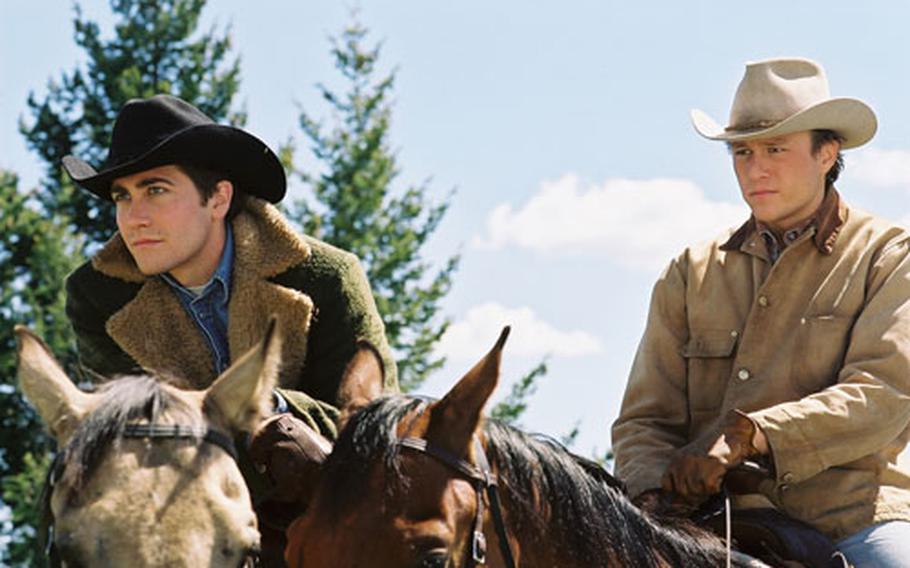 Jake Gyllenhaal, left, and Heath Ledger star as cowboys — and ill-fated lovers — in “Brokeback Mountain.” As an independent film with limited prints available to theaters, it won’t make it to overseas military screens, officials say.
