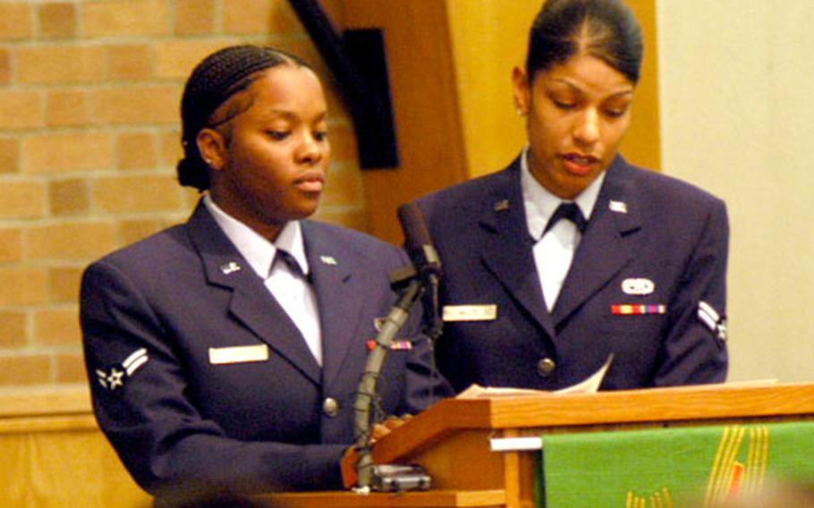 Airman 1st Class Sheenica Giles, left, and Airman 1st Class Teresa Hastie recount stories Wednesday about their friend, Airman 1st Class Asia Toney, who was killed Dec. 24 while on leave in suburban Chicago.