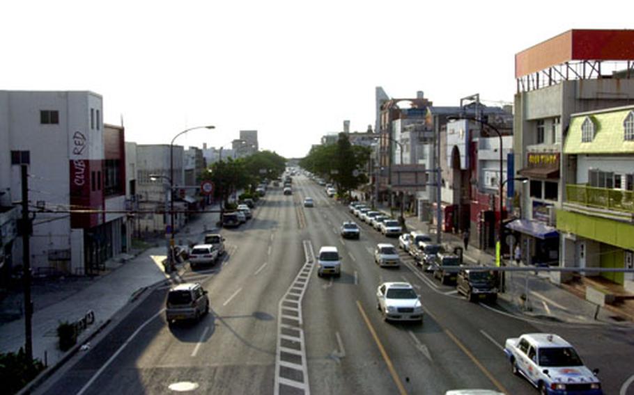 Okinawan businesses on Gate Two Street saw a sharp decline in business last weekend because of the new Kadena Air Base curfew, owners and employees said.