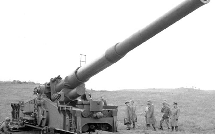July, 1954: Secretary of the Army Robert T. Stevens visits the Baumholder, Germany, training area for a demonstration of firepower that included the 280-mm "atomic cannon," bottom photo.