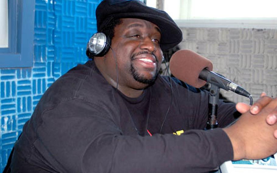 Comedian Bruce Bruce speaks on air at Sasebo Naval Base, Japan, where he had shows scheduled Monday and Tuesday following performances at Yokota Air Base in Tokyo last week.