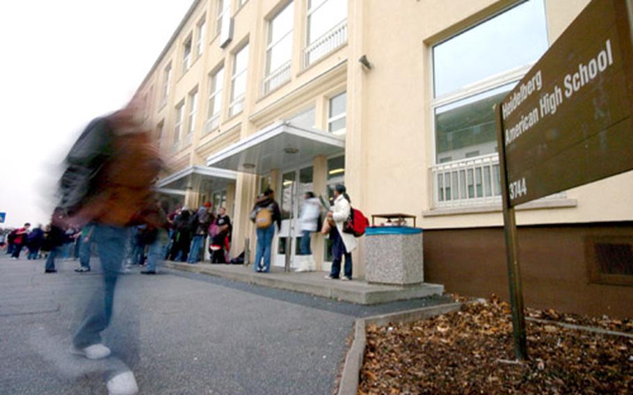 Students exit Heidelberg High School, Germany, after classes on Tuesday. The school was the site of a drug bust and controversial strip-search of some students on Friday.