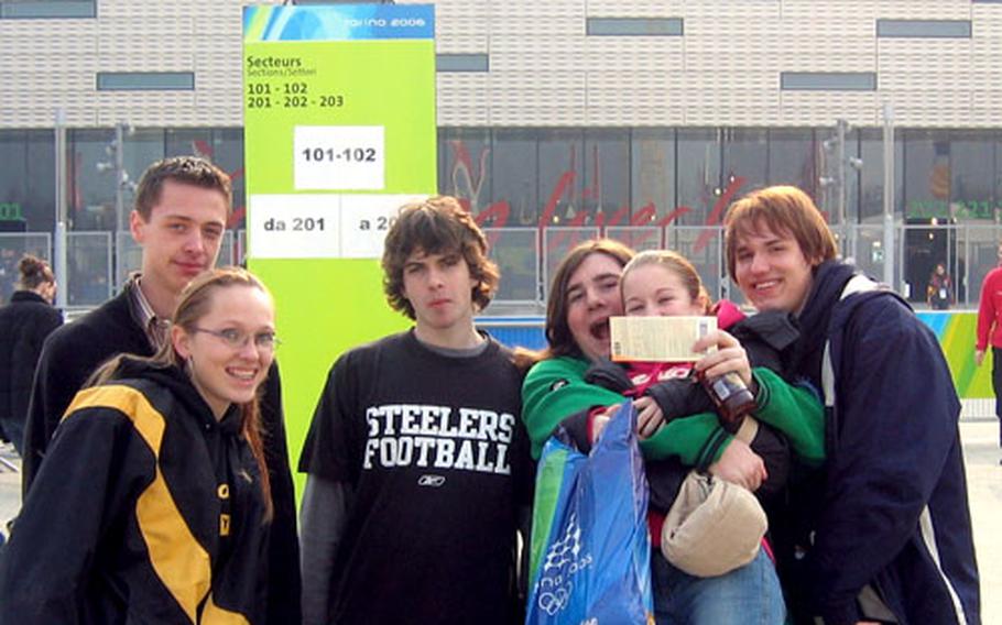 Students from Vicenza Middle High School pose for a photo outside the Torino Palasport Olimpico in Turin, Italy. Students, from left, are Derrik Arthur, Mary Kenney, Tim Sughrue, Steven Merlino, Jessica Boydston and Bruce Case.