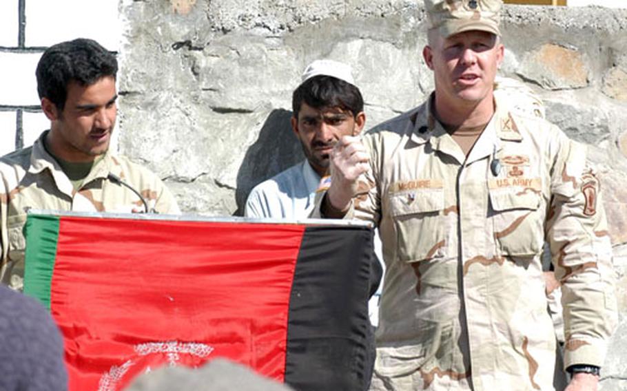 /Lt. Col. Tim McGuire, commander of the 1st Battalion, 508th Infantry Regiment, speaks at a ribbon-cutting ceremony Wednesday for the new school in Zeruk, Afghanistan. The Red Devils are set to leave the province of Paktika at the end of the week.