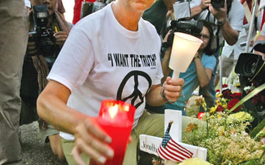 Cindy Sheehan, of Vacaville, Calif., leads a candlelight vigil near President Bush’s ranch in Crawford, Texas, on Aug. 17, 2005. Sheehan is planning to visit U.S. military installations in Germany next month.
