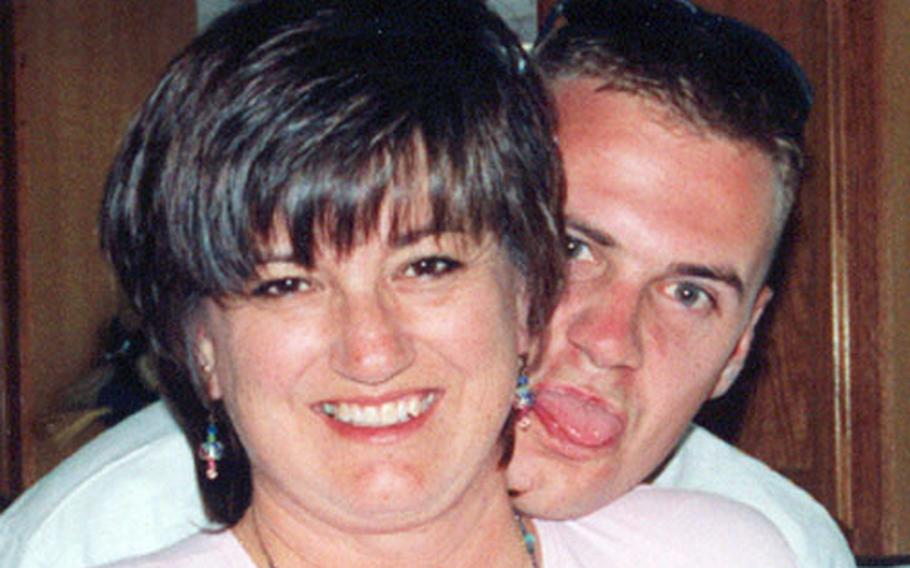 Karen Meredith and her son, Army 1st Lt. Ken Ballard, mug for the camera in 2002. Meredith pushed for changes in casualty notification policies after several mix-ups surrounding the notification she received of Ballard’s death in 2004.