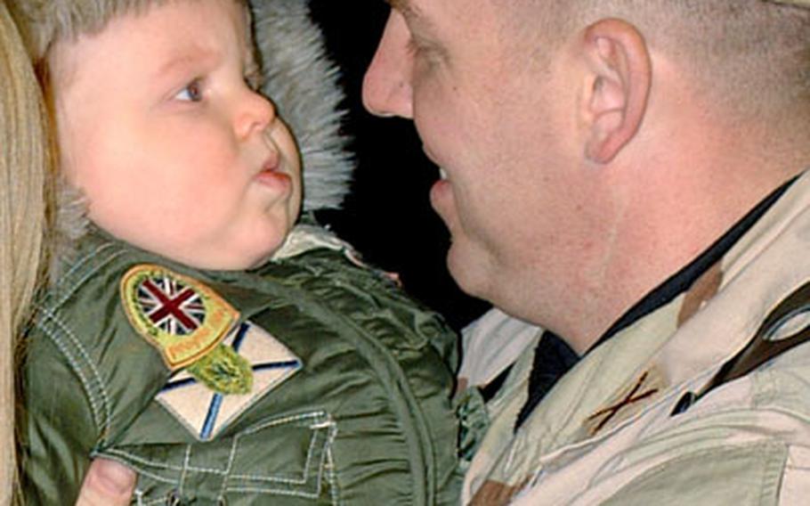 Nicholas Czarkowski isn’t sure what to make of the man holding him — his father. Capt. Kevin Czarkowski is one of hundreds of Southern European Task Force and 173rd Airborne Brigade soldiers returning to nothern Italy after a yearlong deployment to Afghanistan.