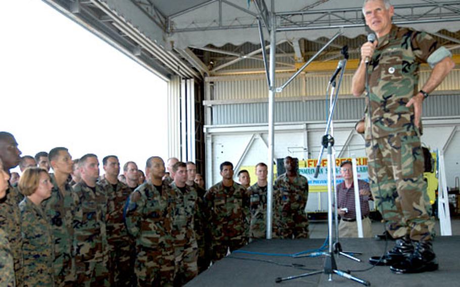 Adm. William J. Fallon, U.S. Pacific Command commander, made a brief stop Thursday in the Philippines to thank U.S. servicemembers participating in Balikatan for their dedication to helping the country’s people respond to the deadly Feb. 17 mudslide.