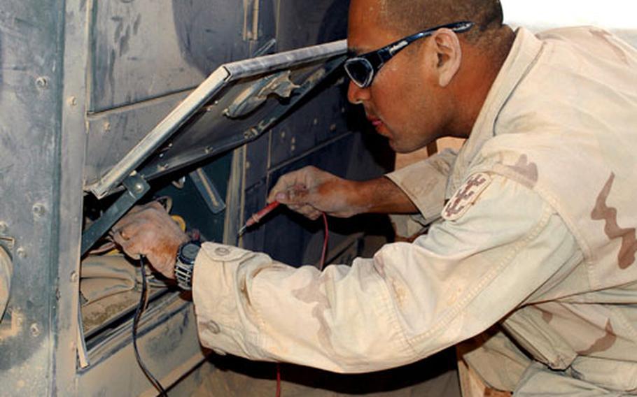 Spc. Hugo Romero, Headquarters Support Company, 94th Engineer Combat Battalion (Heavy), worked last August in Rawah, Iraq.