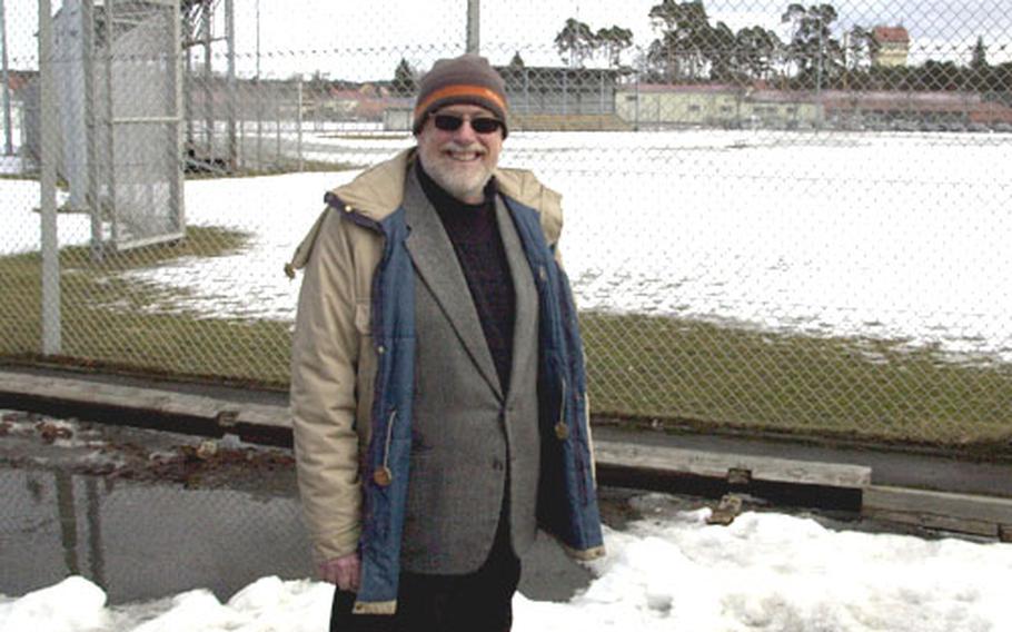 Steve Vojtecky, DODDS liaison officer for Grafenwöhr and Vilseck, Germany, stands at the softball field where a temporary middle school will be built in Grafenwöhr.