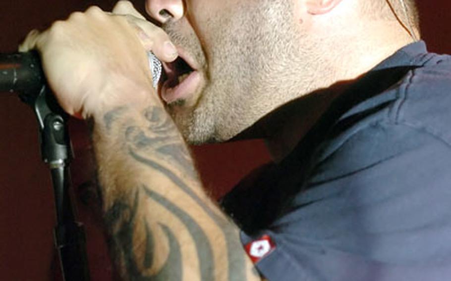Staind's Aaron Lewis, onstage Friday night at Baumholder, Germany.