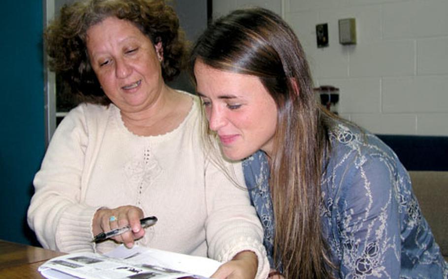 Liz Rouse, left, president, and Christine Thomas, vice president of the Okinawan American Animal Rescue Society, are seeking new owners for 40 dogs destined to be euthanized unless new homes are found by the end of March. OAARS plans to host a pet adoption event Saturday on Camp Foster.