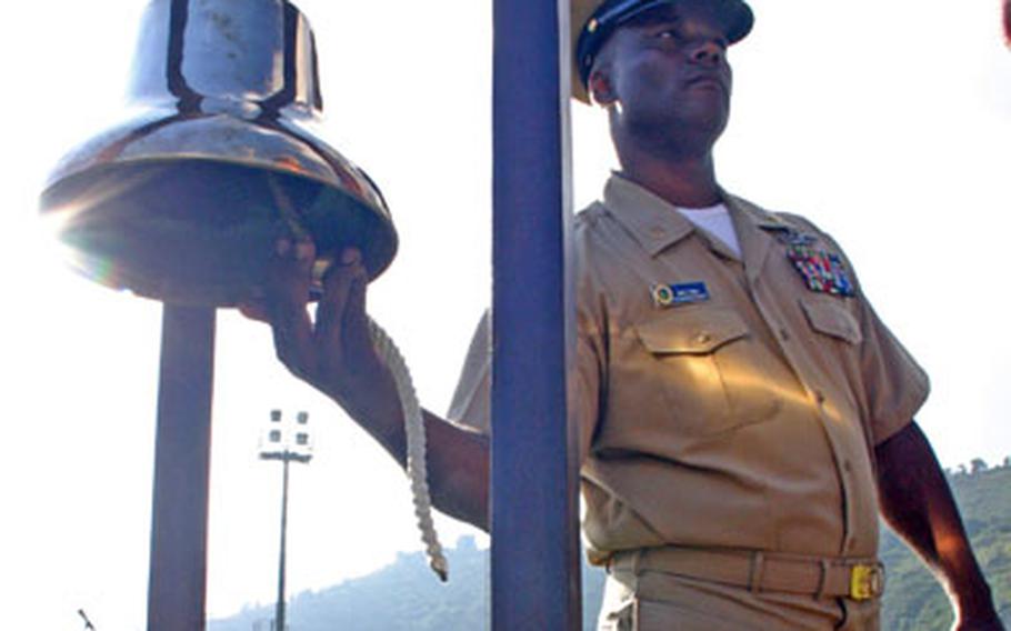 Chief Petty Officer Aaron Caples rings the “Chief’s Bell” last September after being pinned with the coveted golden anchors. The bell-ringing tradition will continue as the Navy prepares to require attendance of a CPO Academy for newly selected chief petty officers.