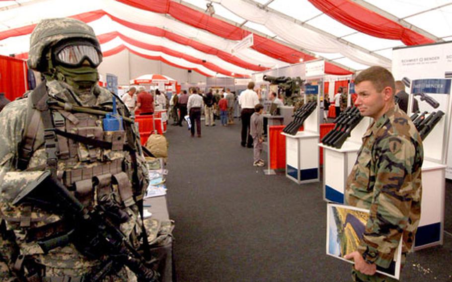 Inside the big tent at the Land Combat Expo 2005 in Heidelberg, Germany. The Land Combat Expo, a popular event with soldiers, has been canceled this year because of deployments and transformation of the troops in Europe, according to U.S. Army Europe officials.