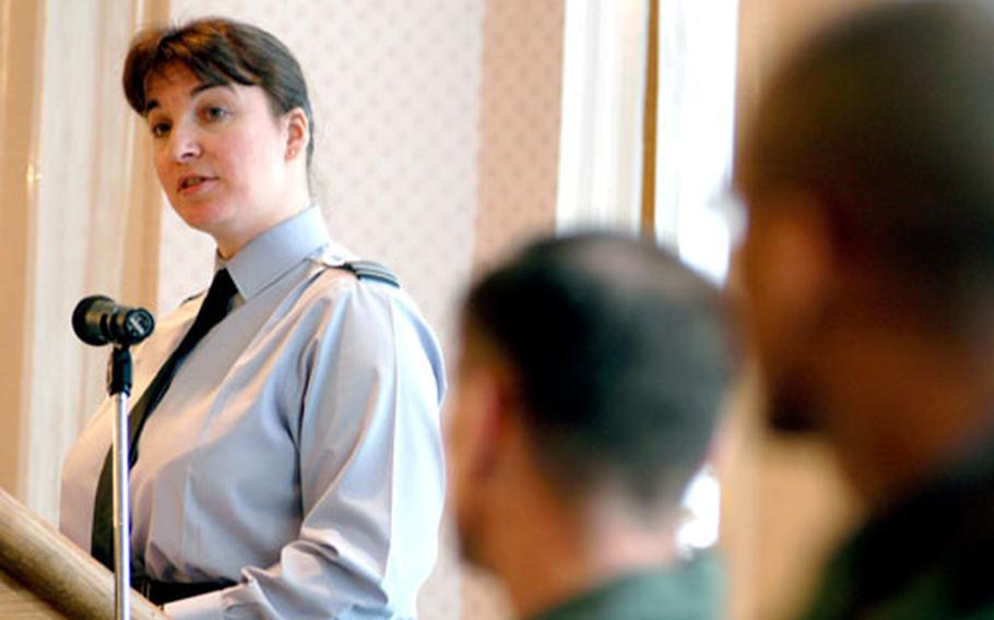 British Squadron Leader Jo Daniels, RAF Lakenheath commander, addresses a crowd last week at Middleton Hall. Daniels was the guest speaker at a Women’s History Month luncheon.