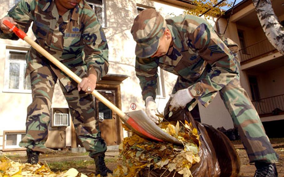 Airmen at Rhein-Main Air Base, Germany, dispose of leaves during Fall Clean Up, part of USAFE’s Combat Proud Program in this 2003 file photo. USAFE officials have decided to drop or change many of the “Combat” programs, which were introduced by former commander, Gen. Robert “Doc” Foglesong.