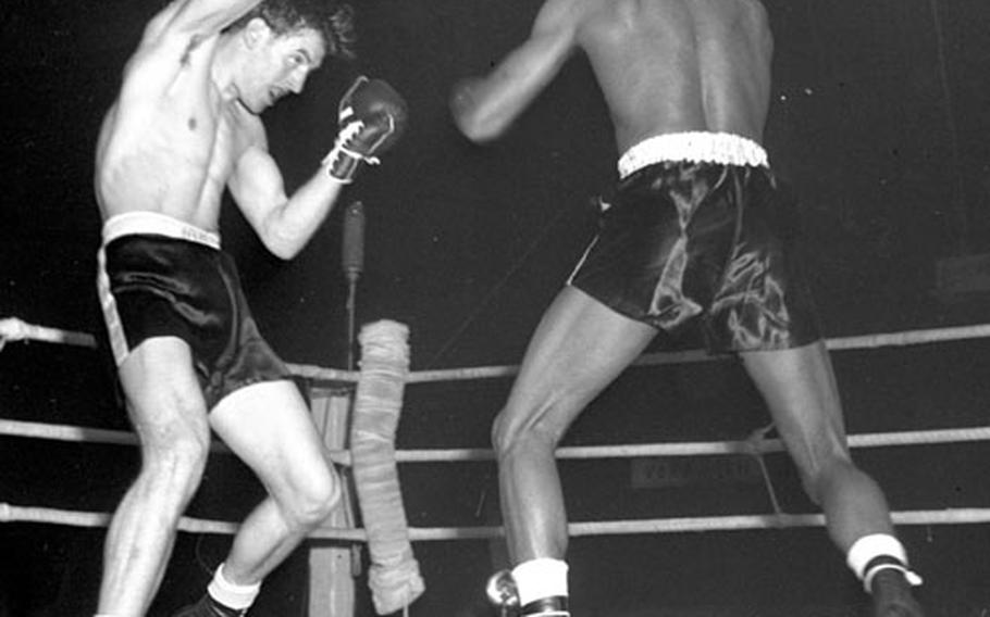 Robinson sends Stretz to the floor, a common sight during the bout.