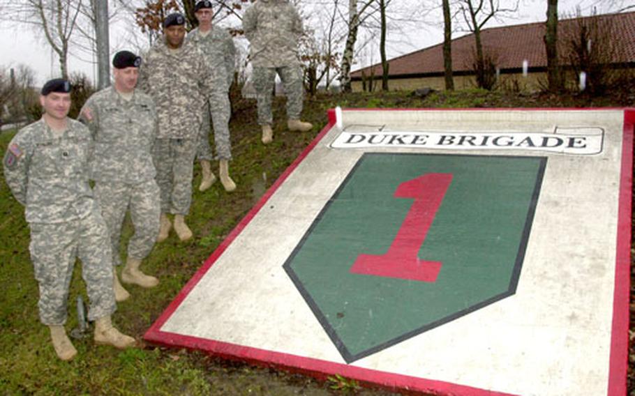 3rd Brigade, 1st Infantry Division soldiers Capt. Dan Woodlock of Boca Raton, Fla.; Master Sgt. Thomas MacIntyre of Windsor, Vt.; Staff Sgt. Robert Laury of Jackson, Miss.; Sgt. 1st Class Michael Vogt of St. Petersburg, Fla.; and Sgt. 1st Class Dennis Hamer of Chicago are part of a team that will welcome the 2nd Cavalry (Stryker) Regiment to Vilseck, Germany, this summer.