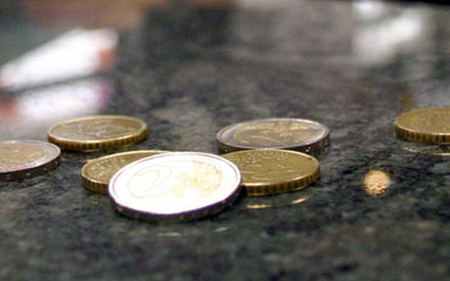 Are the euro coins on the counter real? With technological advances in reproduction machines, it's hard to tell.