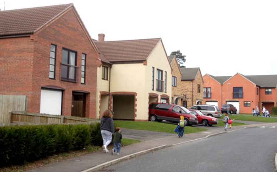 Children head to their homes inside the U.S. housing area in Thetford after a recent school day. Some residents blame the neighborhood’s close proximity to Abbey Estates, a large public housing project, for an uptick in crime, largely burglaries of garages, sheds and cars.