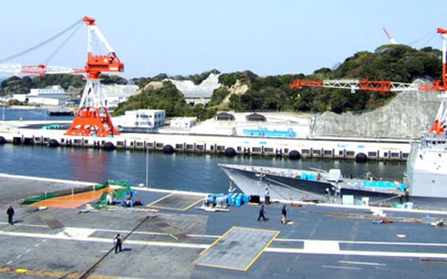 The heaviest lifters at Yokosuka Naval Base are cranes Yokozuna and Ozeki. They are named for the first- and second-place sumo wrestlers.