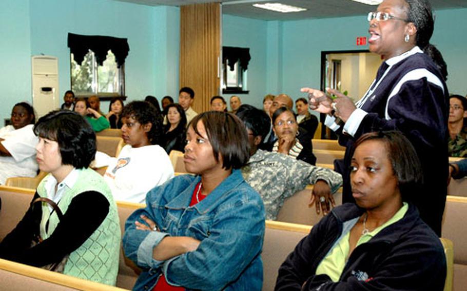 Sgt. 1st Class Sharon Oliver, who works for the 8th U.S. Army’s resource management office, asked when Col. Ron Stephens would know when proposed moves from Hannam Village would happen. “I don’t know,” Stephens told about 100 people Tuesday night. “We are so close,” he added.