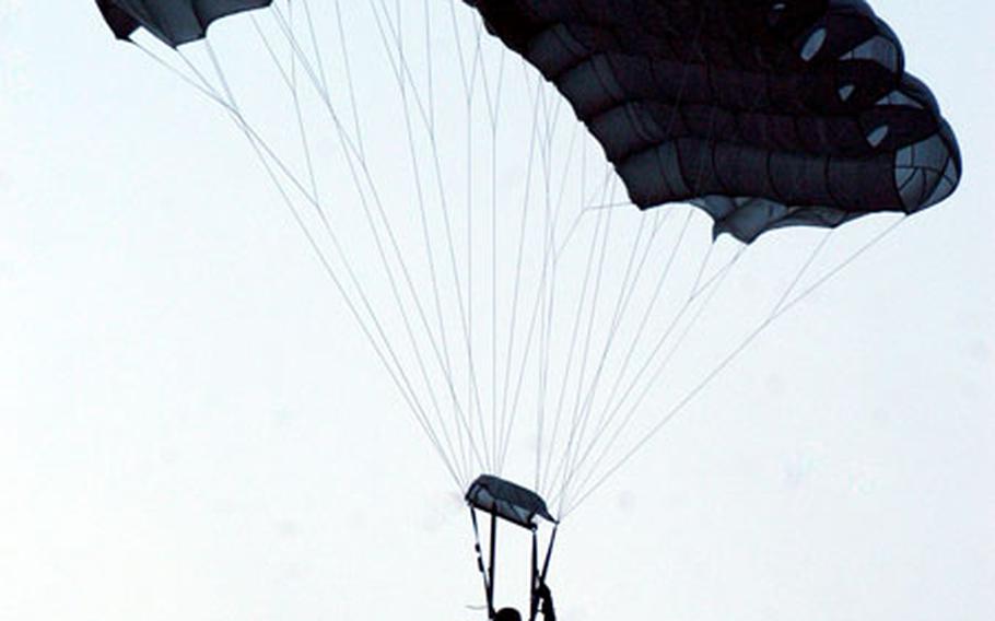 A member of the 321st Special Tactics Squadron descends to the drop zone during a recent High-Altitude Low Opening parachute jump at RAF Watton, a decommissioned base near RAF Mildenhall.