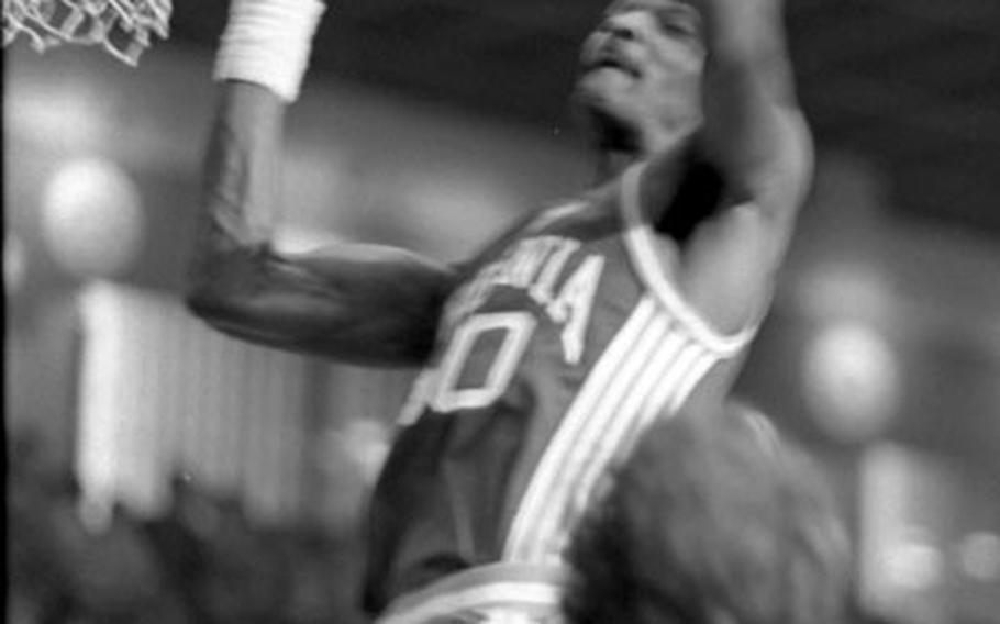 Virginia&#39;s Ralph Sampson stakes out his territory under the basket during a game against Utah at Tokyo in December, 1982.