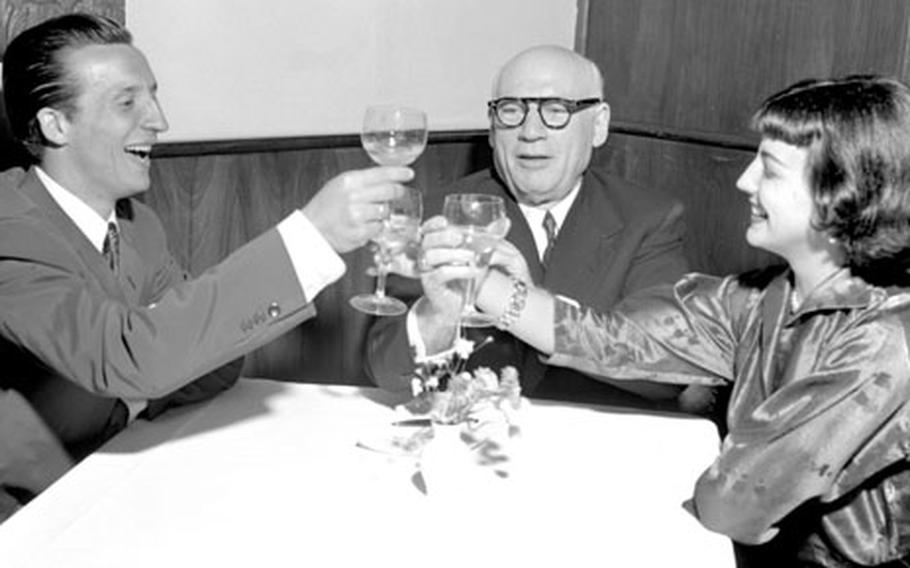 Sol Hurok, with Hungarian ballet stars Nora Kovats and Istvan Rab in Munich in June, 1953.