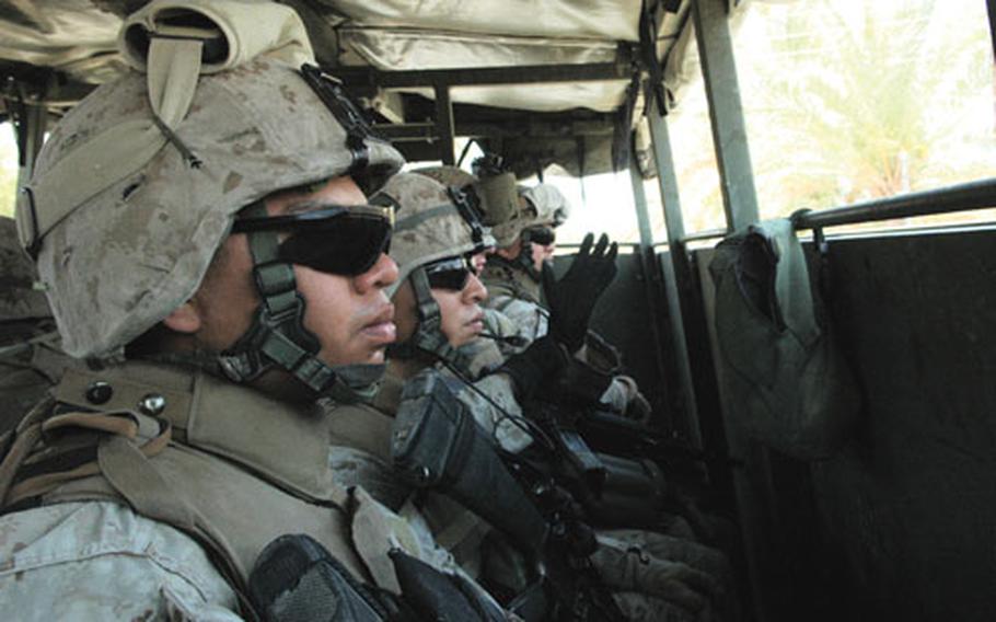 A truckload of Marines heads out into Haditha, where many locals remain angry about the alleged massacre of civilians by a previous Marine unit last fall.