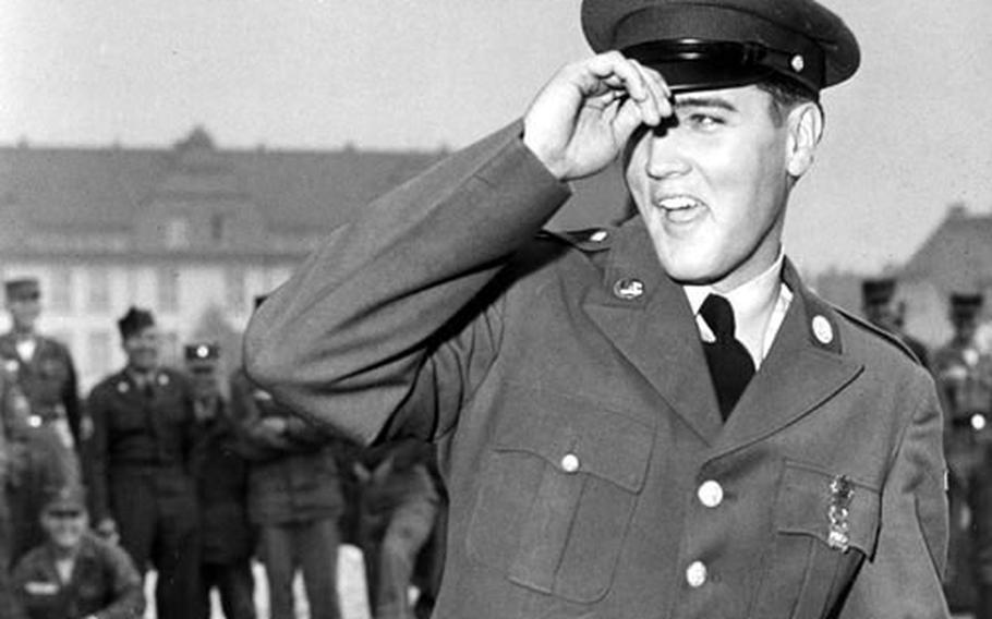 Pvt. Elvis Presley of 1st Medium Tank Battalion, 32nd Armor, 3rd Armored Division arrives at Ray Barracks in Friedberg in October, 1958, to begin his 18-month overseas tour.