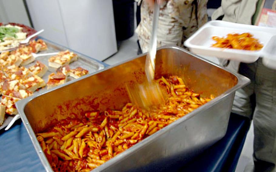 Italian Brig. Gen. Carmine De Pascale, commander of Italian Joint Task Force in Iraq, commissioned a feast to accompany the game.