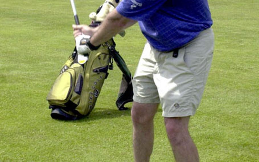 Hohenfels-based Joint Multinational Readiness Center soldier Lt. Col. Craig Jones, 41, plays a shot during a military golf tournament at Sinzing Golf Course on Friday.