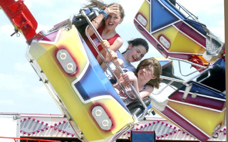 Riders brave the six-legged "Orbiter" at RAF Feltwell.