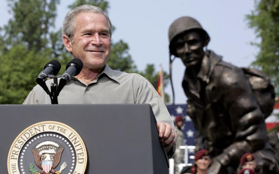 President Bush talks to U.S. troops and family members Tuesday during an Independence Day celebration at Fort Bragg, N.C.