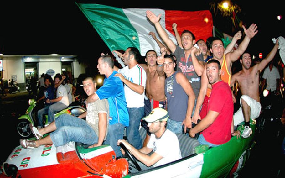 Italian fans take to the streets Tuesday night with flags waving and horns honking to celebrate Italy’s 2-0 victory over Germany in the semifinals of the 2006 World Cup.