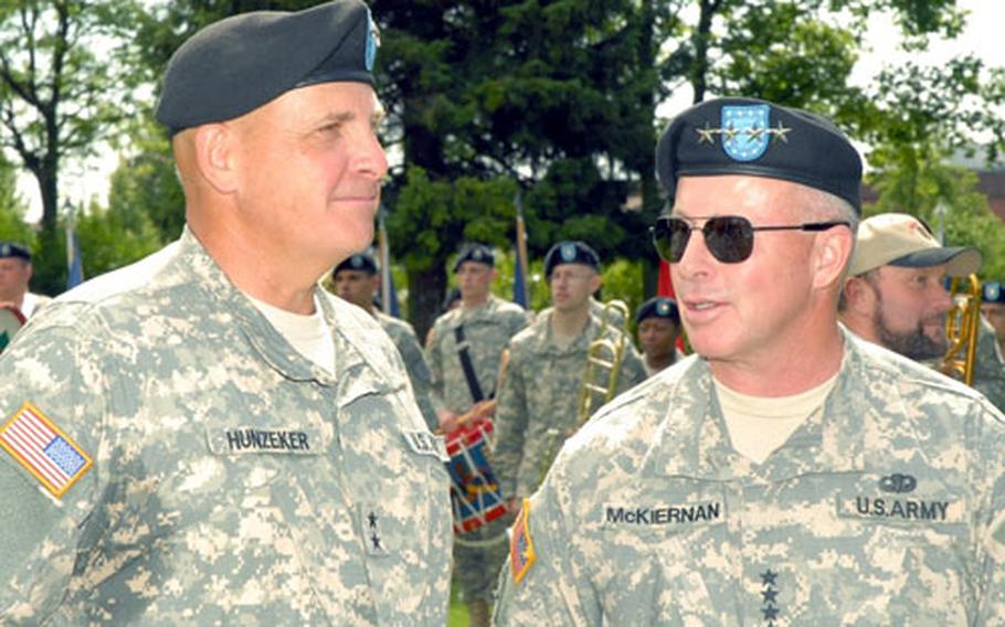 Gen. David McKiernan, right, commander, U.S. Army Europe, and Maj. Gen. Kenneth W. Hunzeker, commander, 1st Infantry Division, chat after the ceremony.
