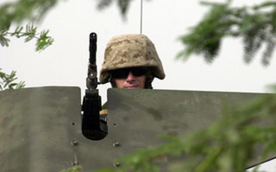 U.S. Marines assigned to Camp Lemonier in Djibouti conduct a security patrol outside the gates last month.
