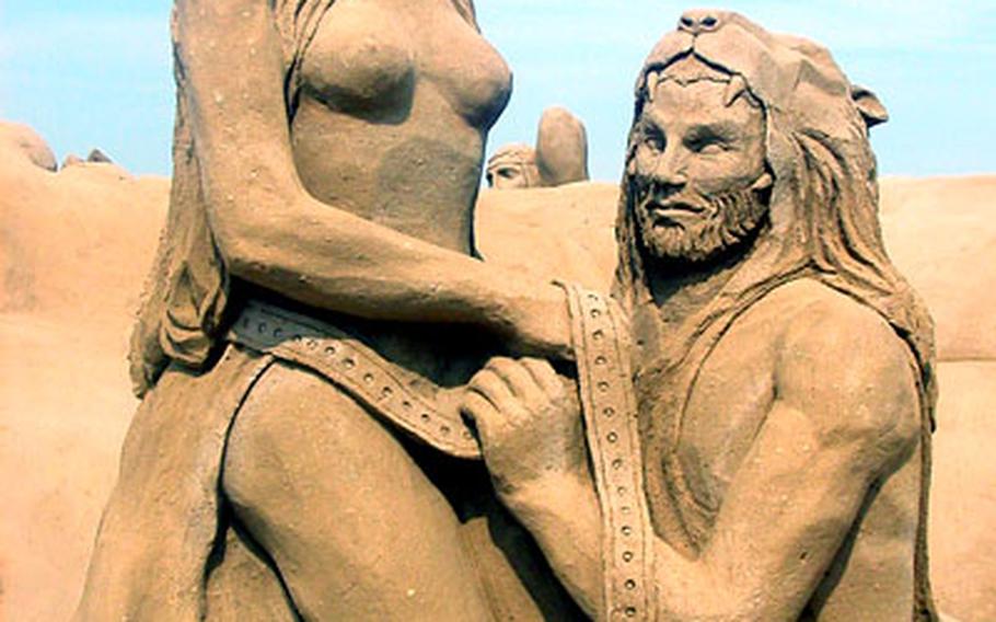 When a man loves a woman — in sand.